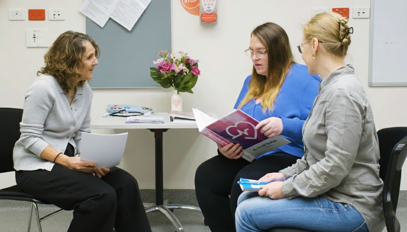 A woman putting a cotton bud in her mouth