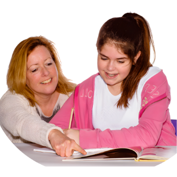 A girl receiving suppprt to write or read 